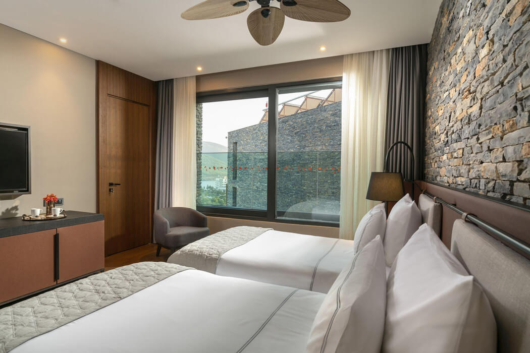 Lujo Hotel Bodrum - dwa łóżka w pokoju family corner suite