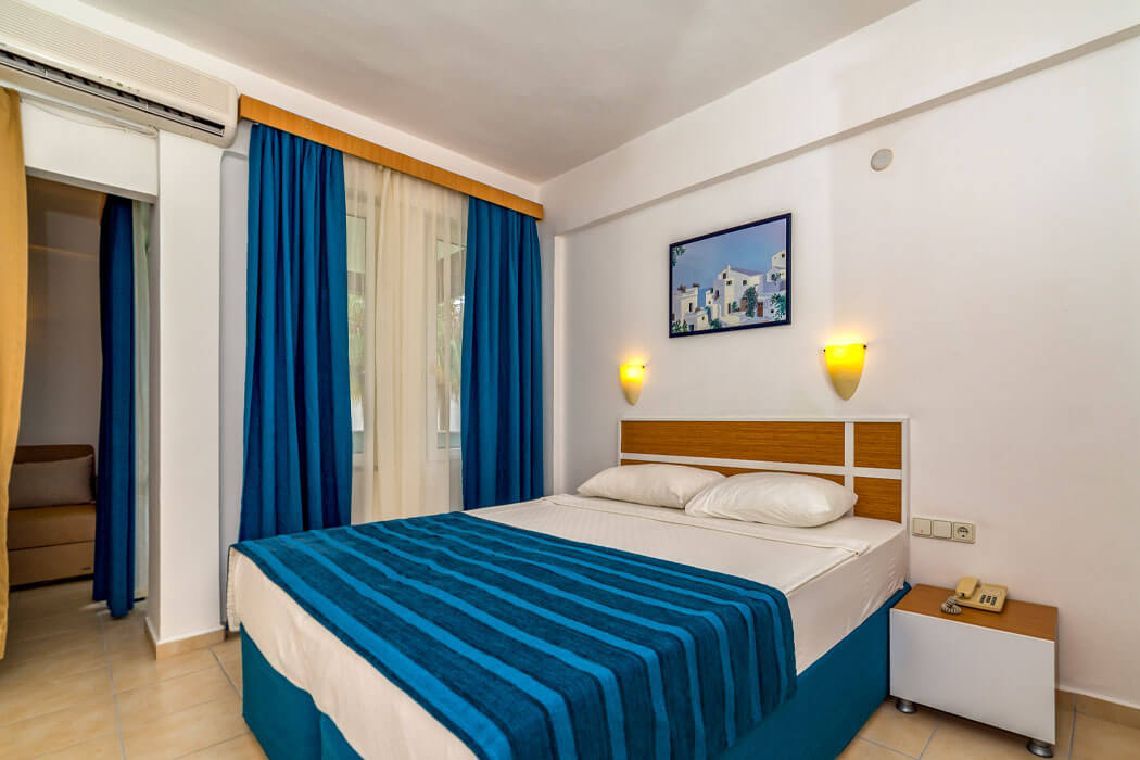 Hotel Armas Green Fugla Beach - łóżko w pokoju standardowym